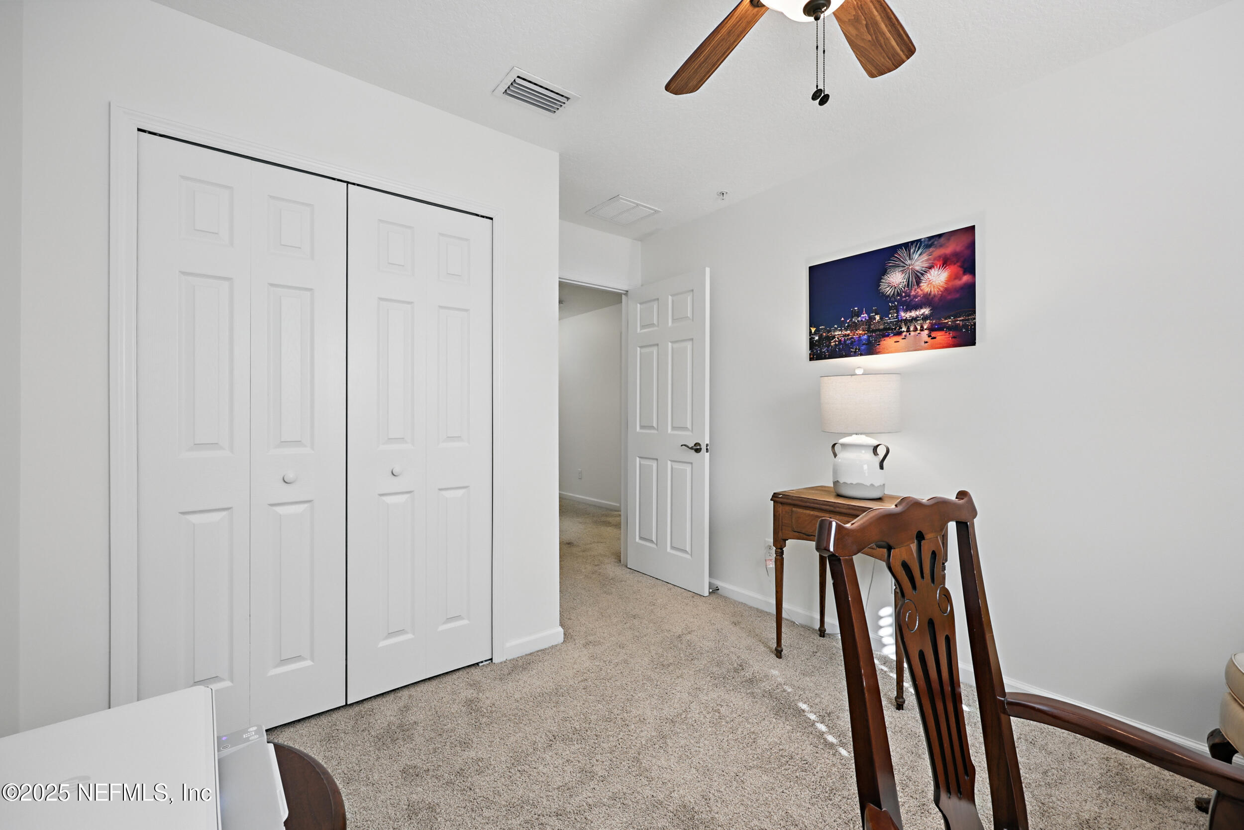 63 Via Sonrisa St. Augustine, FL 32092 - Photo 35 of 48 a view of an empty room with ceiling fan