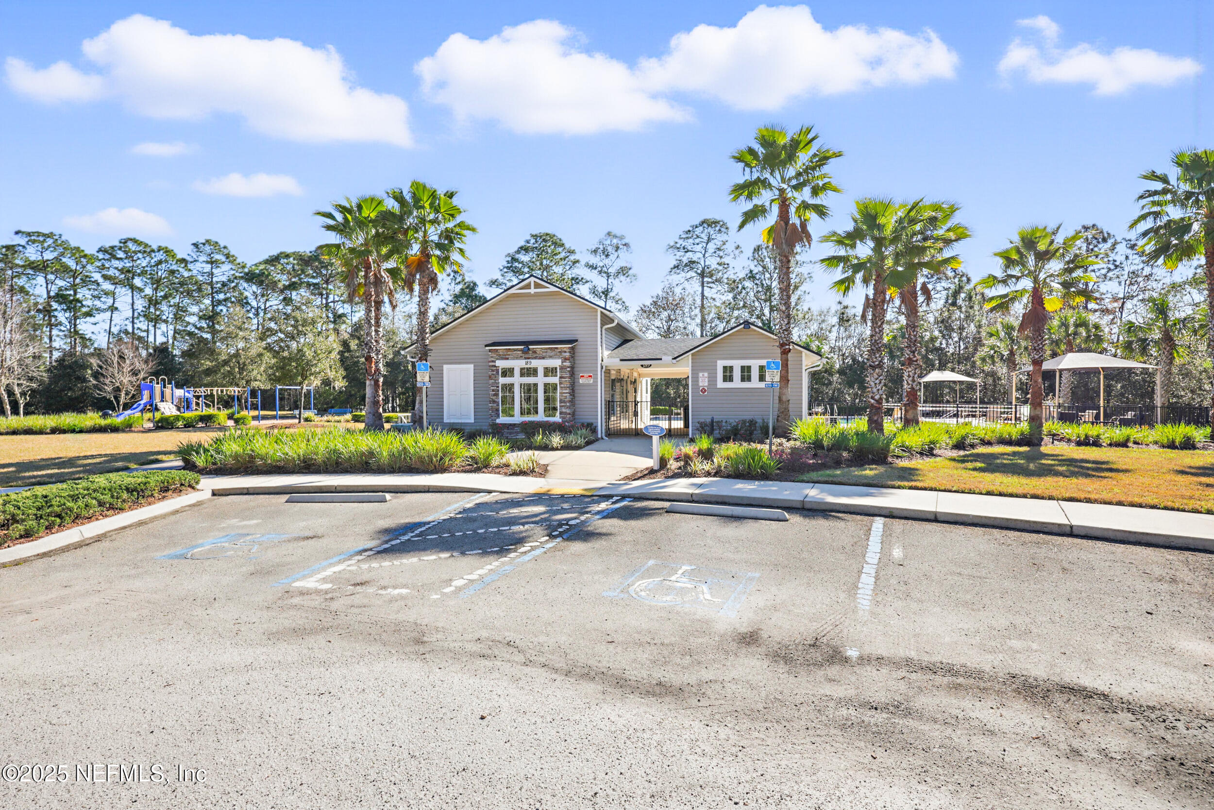 63 Via Sonrisa St. Augustine, FL 32092 - Photo 48 of 48 a front view of house with yard and swimming pool