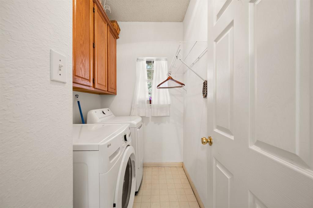 2156 Sandell Drive Grapevine, TX 76051 - Photo 20 of 40 a utility room with dryer and washer