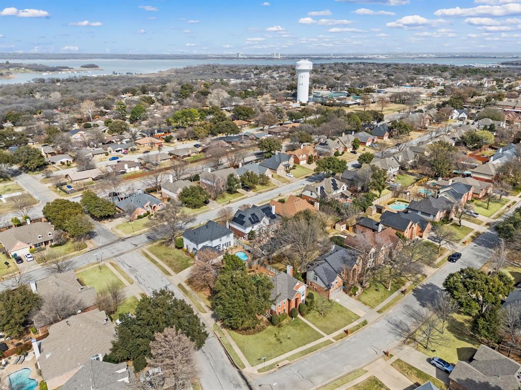 2156 Sandell Drive Grapevine, TX 76051 - Photo 2 of 40 an aerial view of residential building with parking space