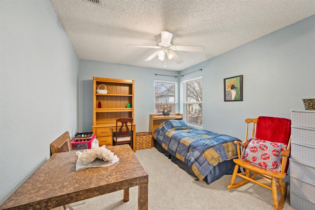 2156 Sandell Drive Grapevine, TX 76051 - Photo 31 of 40 a bedroom with bed and window
