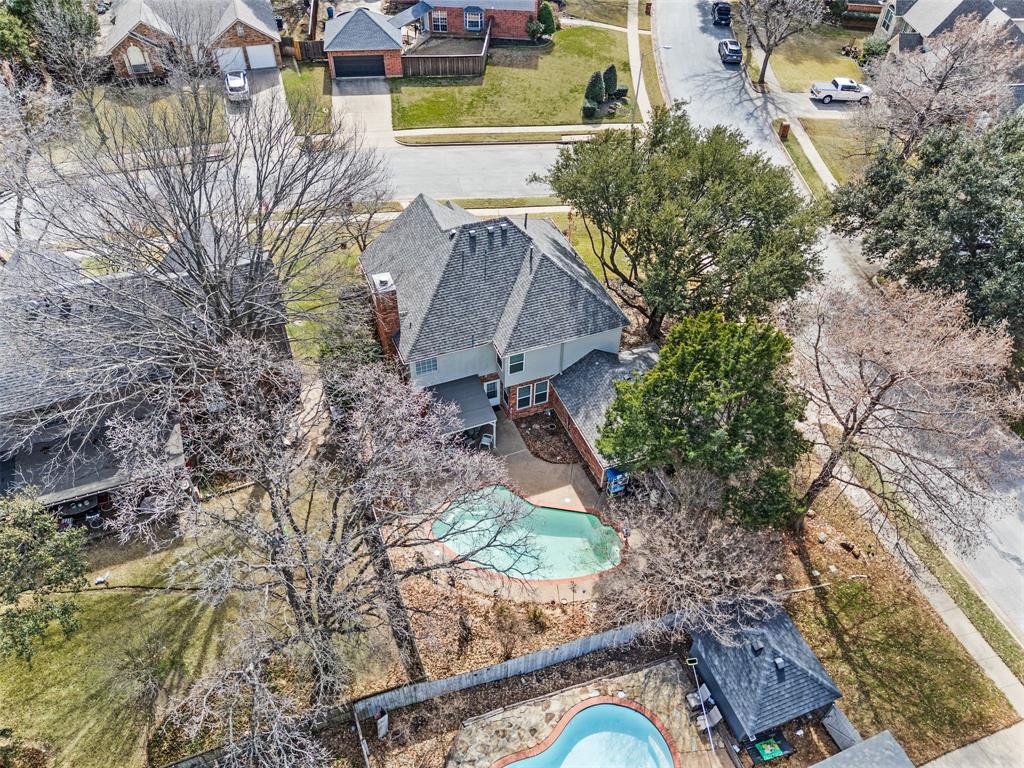 2156 Sandell Drive Grapevine, TX 76051 - Photo 37 of 40 an aerial view of a house with a yard swimming pool and outdoor seating