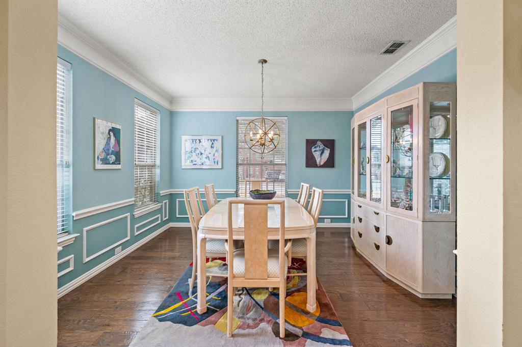 2156 Sandell Drive Grapevine, TX 76051 - Photo 5 of 40 a view of a dining room with furniture window and wooden floor
