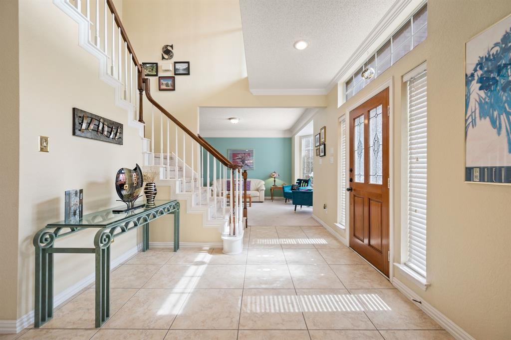 2156 Sandell Drive Grapevine, TX 76051 - Photo 7 of 40 a view of entryway and hall with a living room