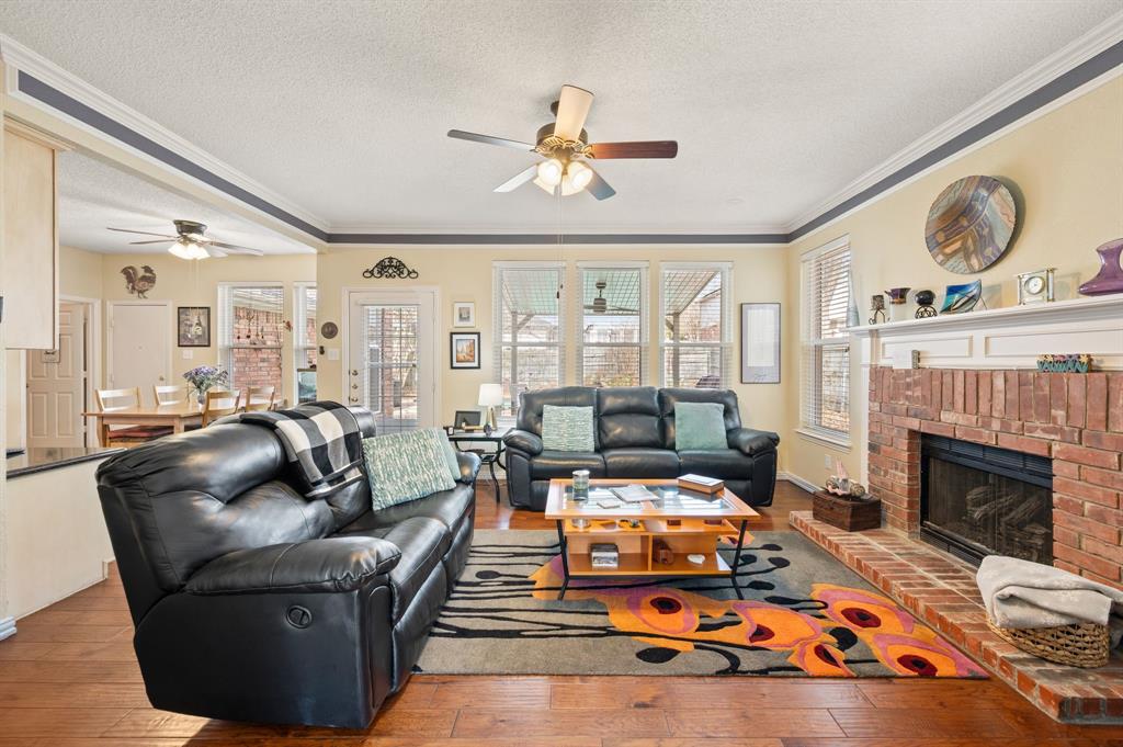 2156 Sandell Drive Grapevine, TX 76051 - Photo 10 of 40 a living room with furniture fireplace and window