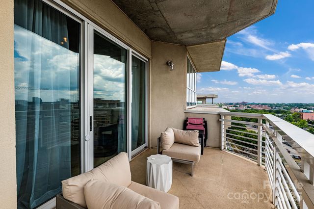 a view of a living room with furniture