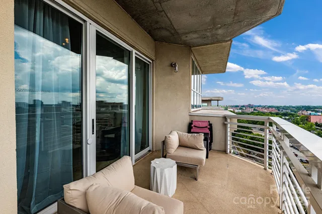 a view of a living room with furniture