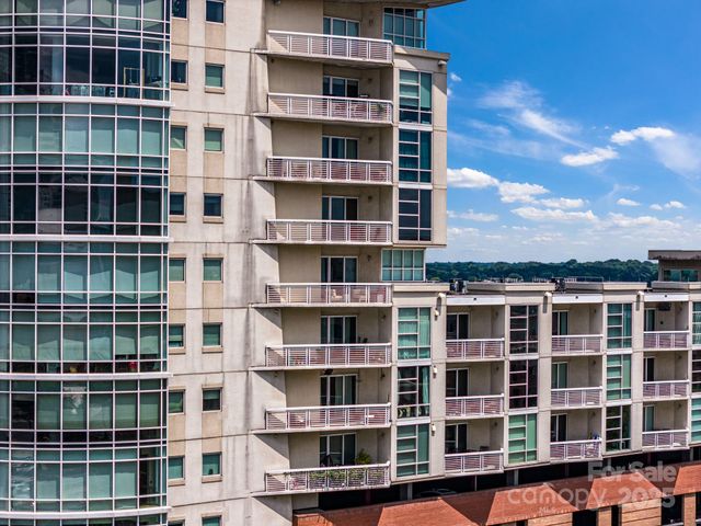 a view of a city with tall buildings