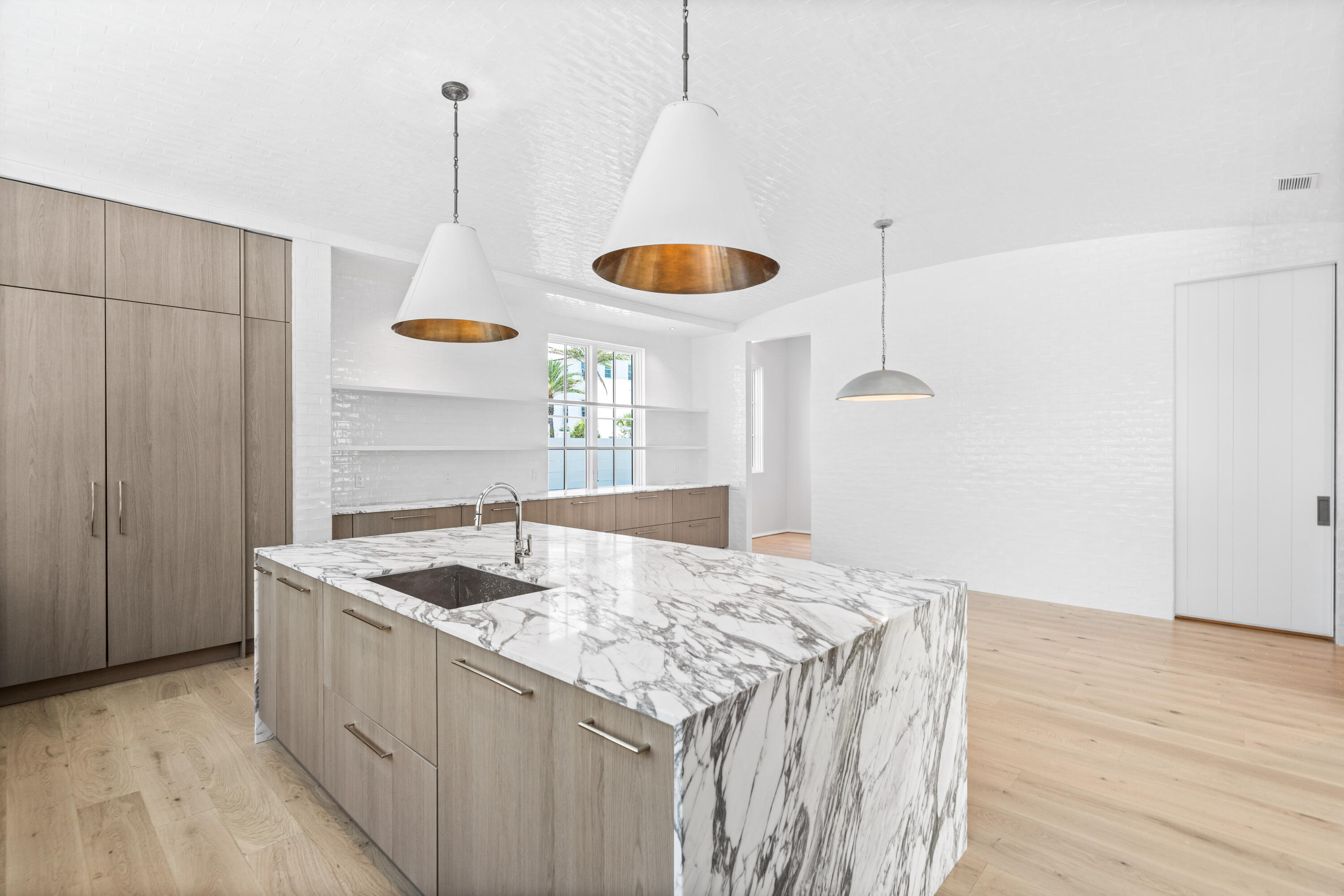 74 Elysee Ct Inlet Beach Inlet Beach, FL 32461 - Photo 15 of 46 a kitchen with stainless steel appliances granite countertop a sink a oven and wooden floor