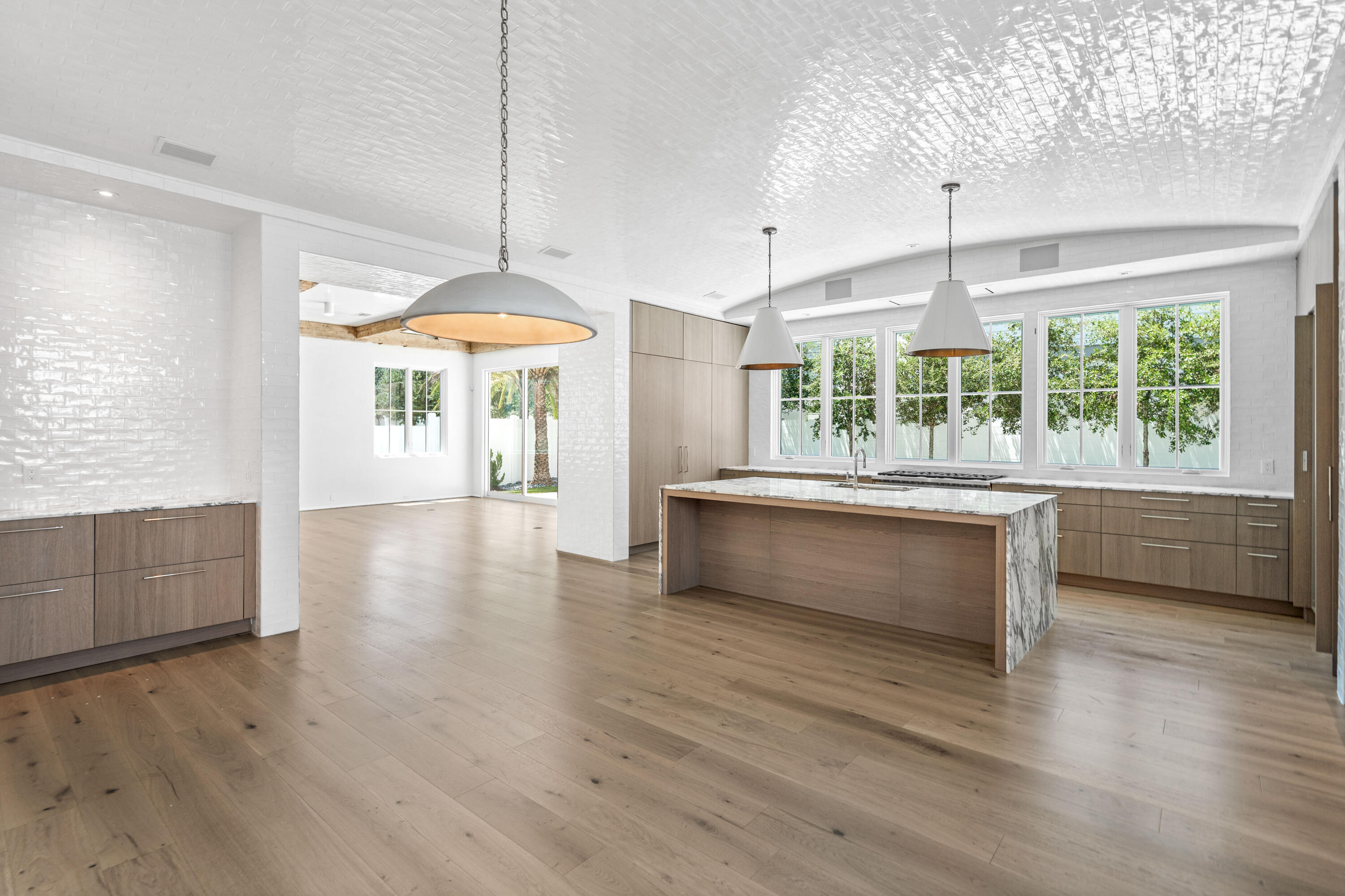 74 Elysee Ct Inlet Beach Inlet Beach, FL 32461 - Photo 16 of 46 a kitchen with stainless steel appliances granite countertop a stove and wooden floor