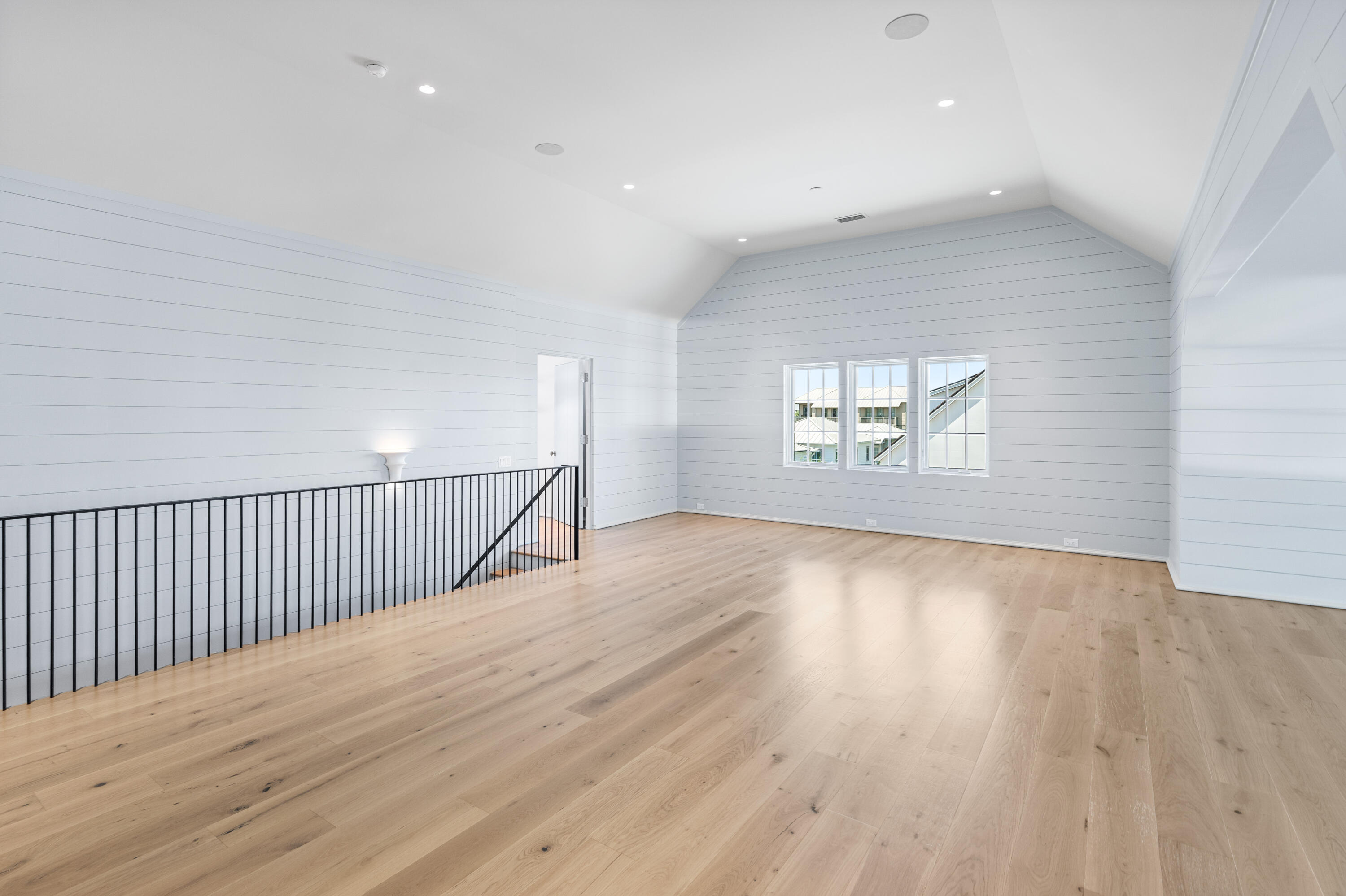 74 Elysee Ct Inlet Beach Inlet Beach, FL 32461 - Photo 36 of 46 wooden floor in an empty room with a window