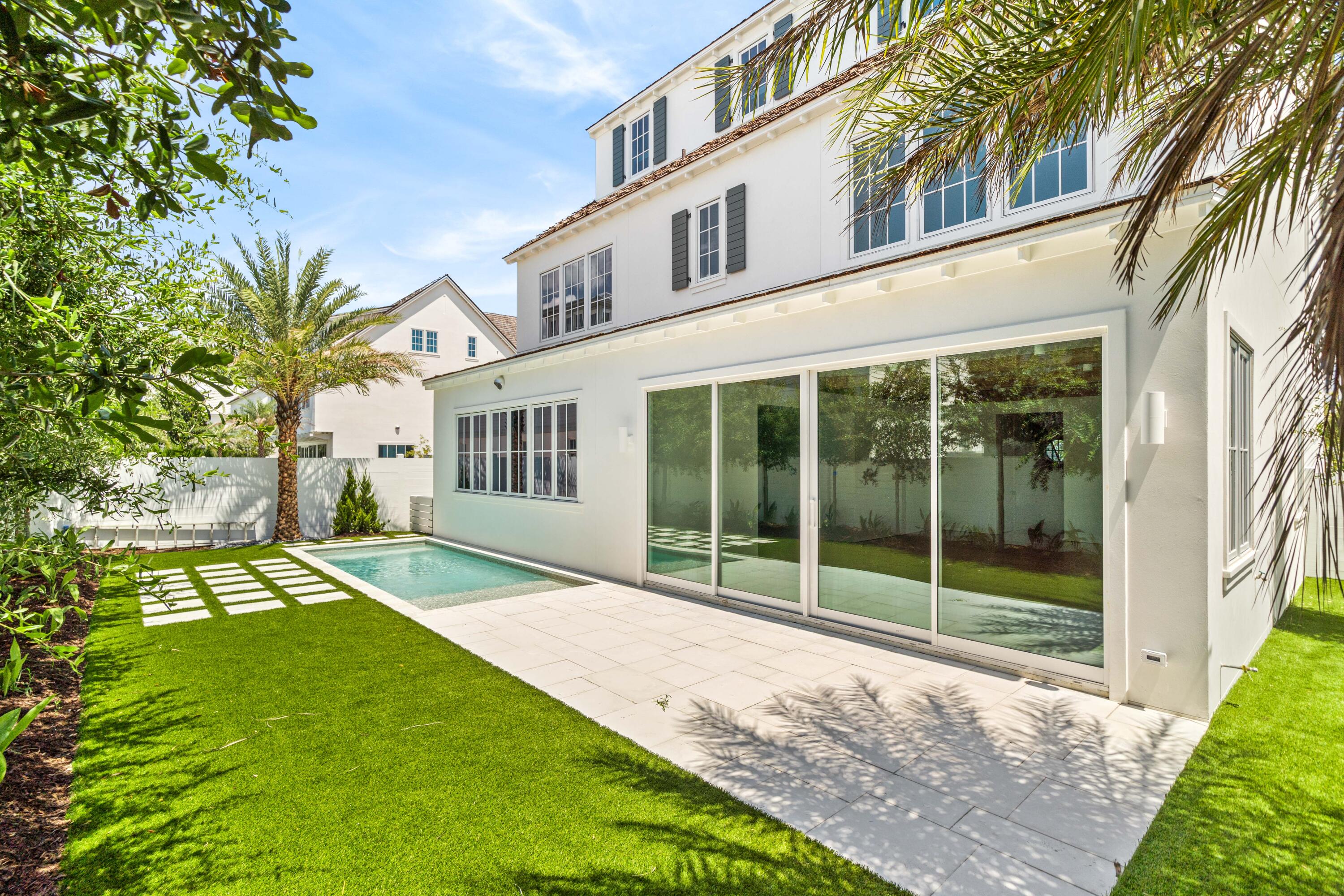 74 Elysee Ct Inlet Beach Inlet Beach, FL 32461 - Photo 4 of 46 a house view with a garden space