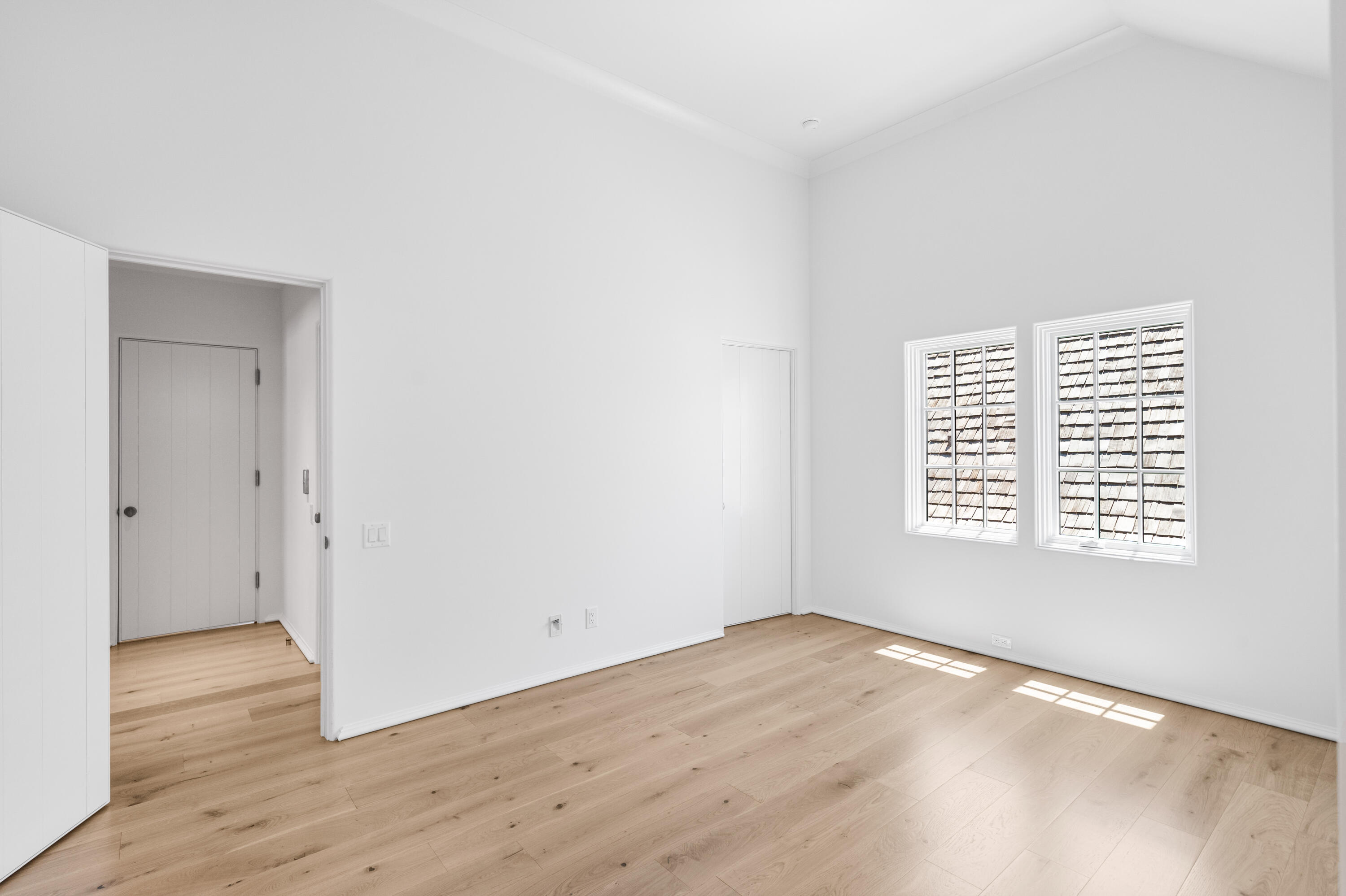 74 Elysee Ct Inlet Beach Inlet Beach, FL 32461 - Photo 45 of 46 a view of an empty room with wooden floor and a window