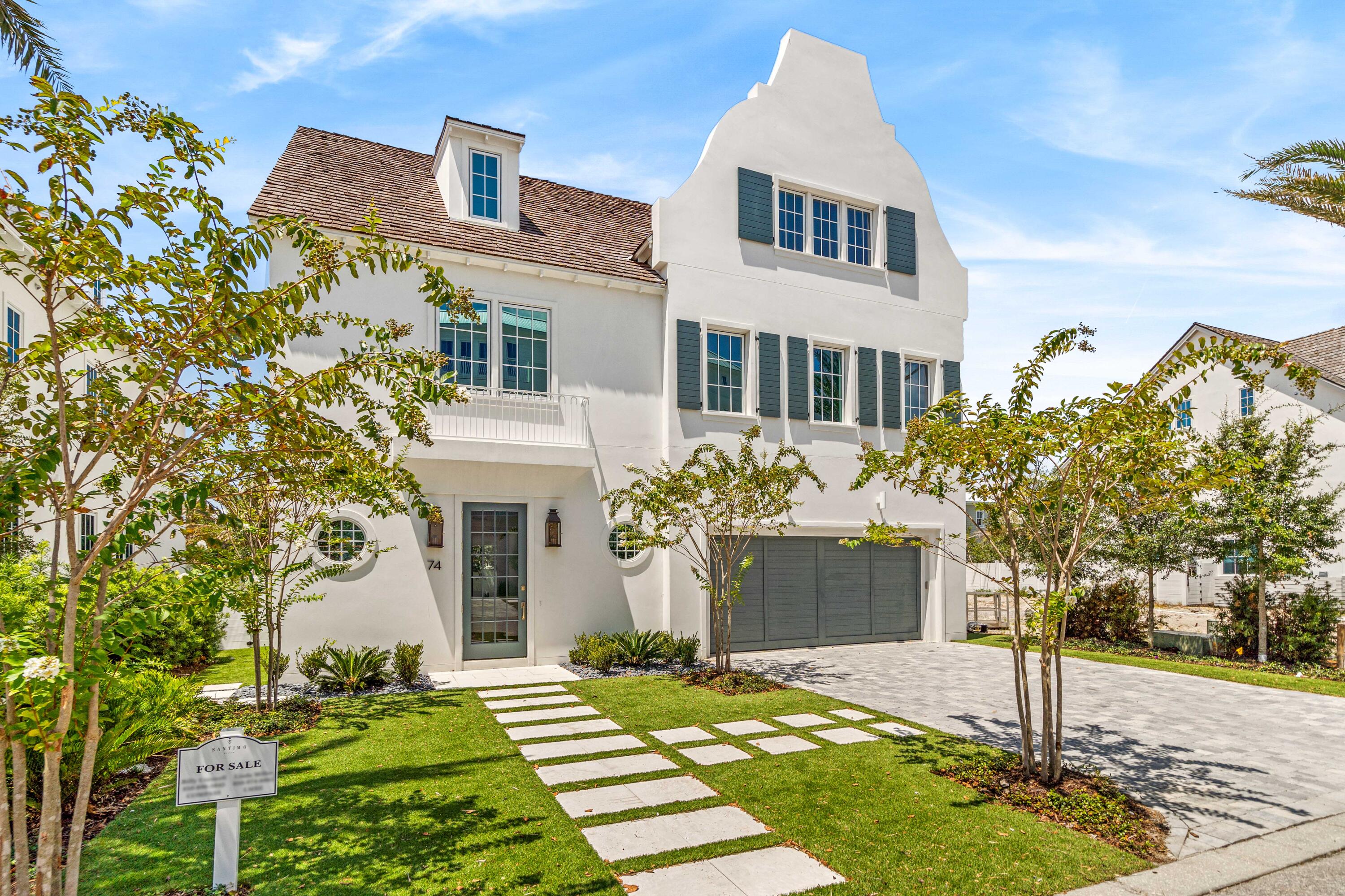 74 Elysee Ct Inlet Beach Inlet Beach, FL 32461 - Photo 6 of 46 a front view of a house with a yard