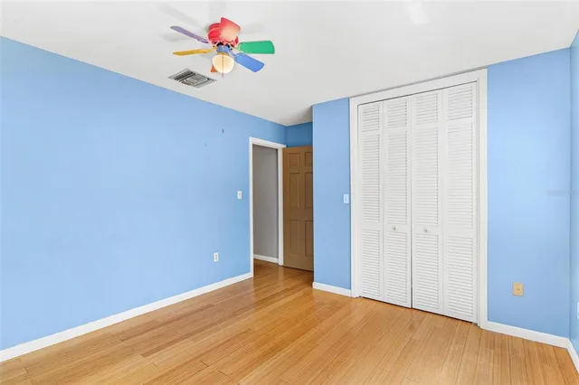 a view of a room with wooden ceiling