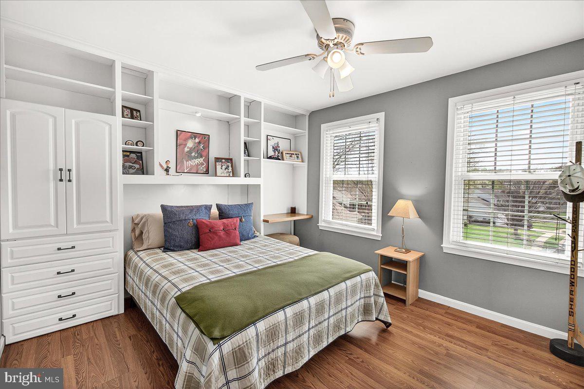 1000 Red Harvest Road Gambrills, MD 21054 - Photo 34 of 69 Front bedroom w/ built-in shelves, desk & storage