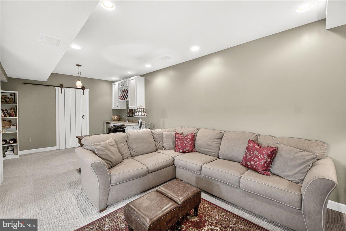 1000 Red Harvest Road Gambrills, MD 21054 - Photo 42 of 69 Basement rec room - sectional sofa conveys