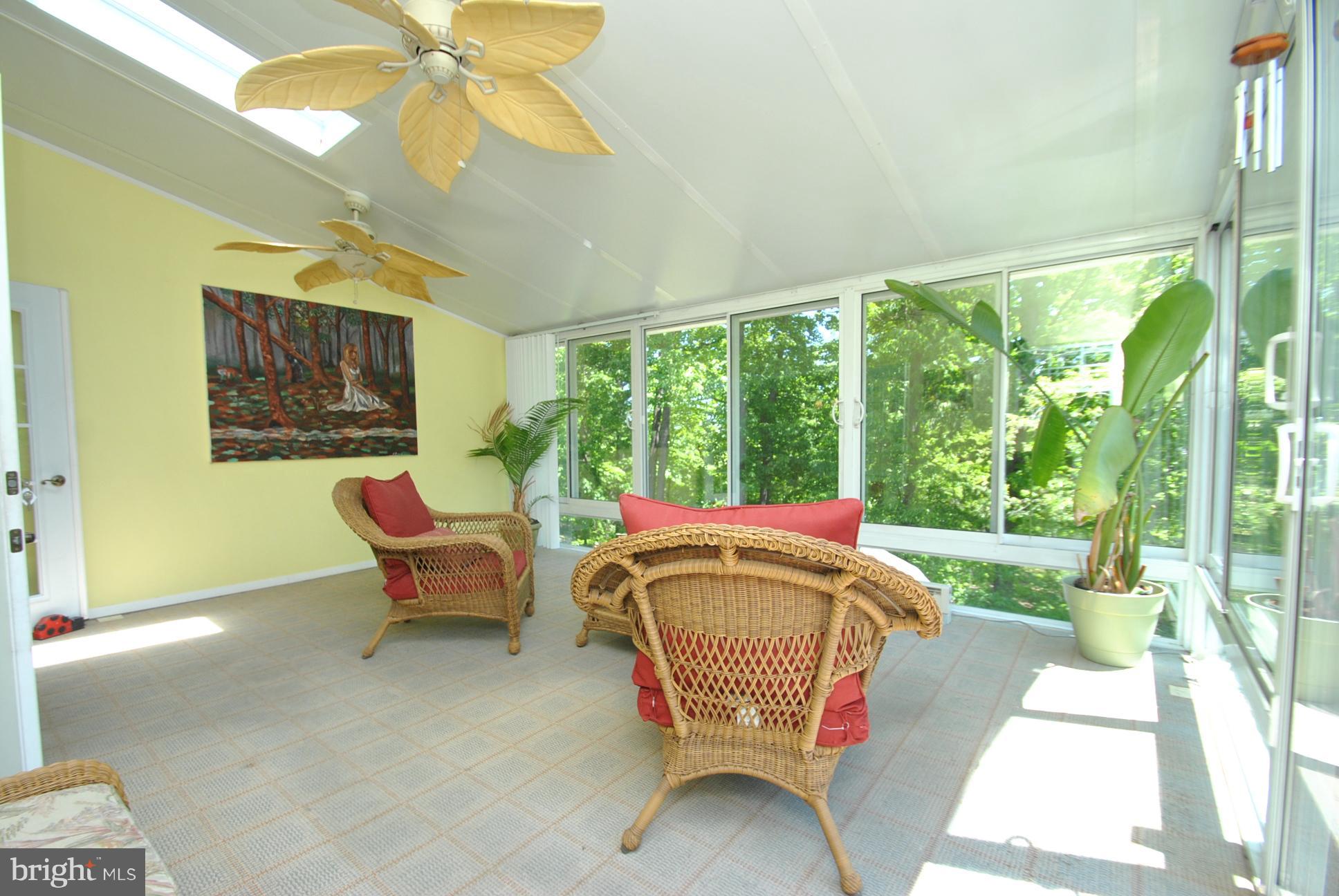 3758 Foxford Stream Road Baltimore, MD 21236 - Photo 15 of 30 ALL SEASON SUNROOM PORCH SURROUNDED BY NATURE
