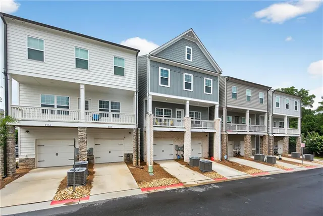 a front view of a building with a street
