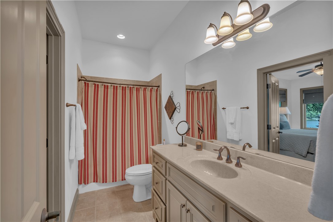 256 Talton Road Six Mile, SC 29682 - Photo 36 of 50 Clean lines and stone counters highlight this well-appointed bathroom space.