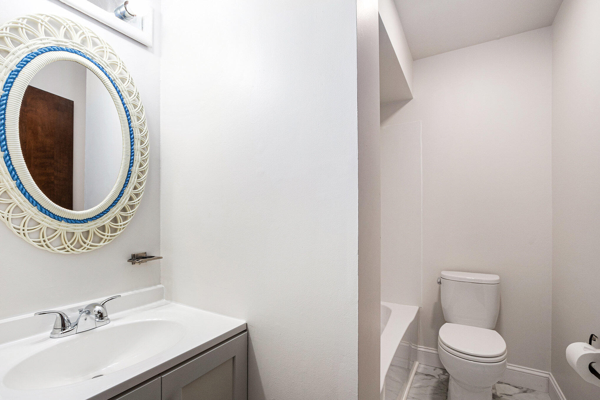 71 Tanglewood Trail Valparaiso, IN 46385 - Photo 11 of 46 a bathroom with a sink mirror and toilet