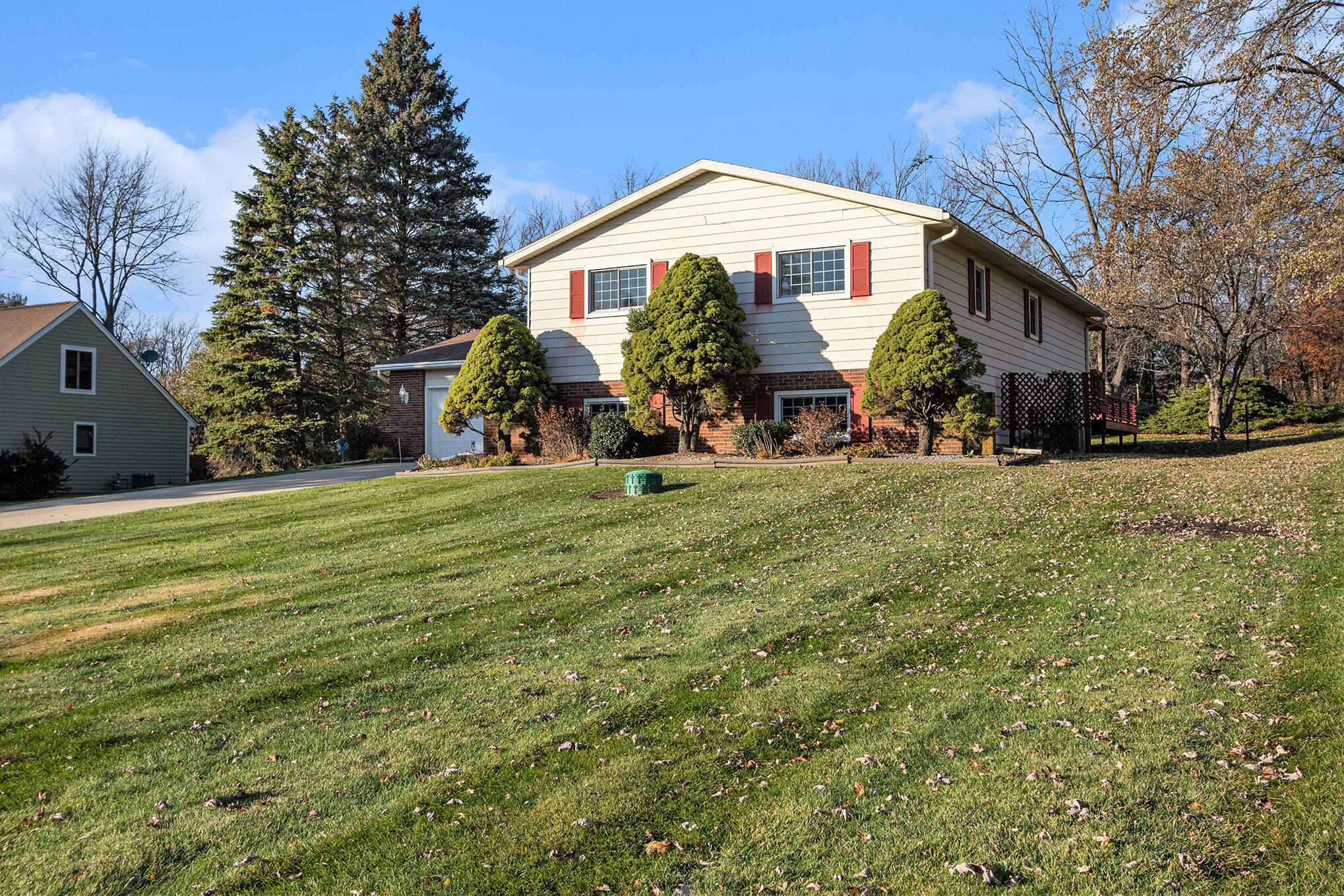 71 Tanglewood Trail Valparaiso, IN 46385 - Photo 3 of 46 a front view of a house with a yard