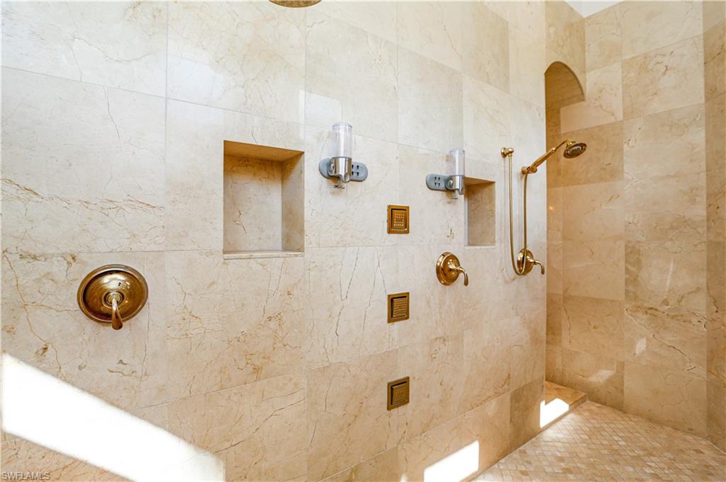 823 Cassena Road Naples, FL 34108 - Photo 25 of 50 a bathroom with a shower