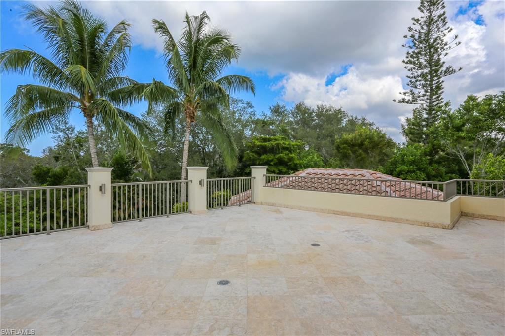 823 Cassena Road Naples, FL 34108 - Photo 49 of 50 a view of a garden