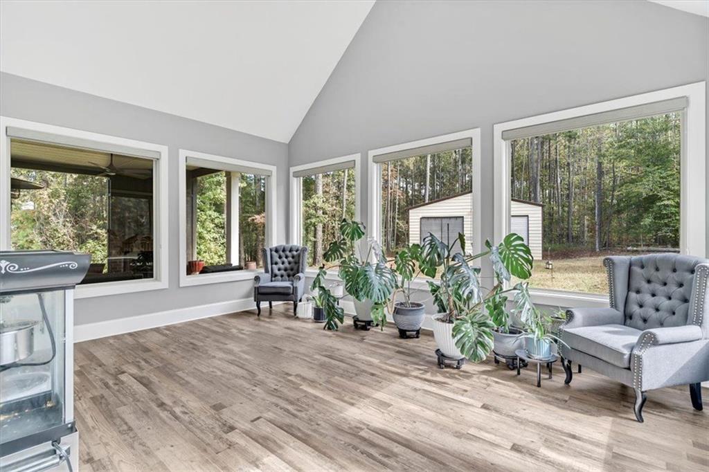 590 Eskew Road McDonough, GA 30252 - Photo 24 of 59 a living room with furniture and windows