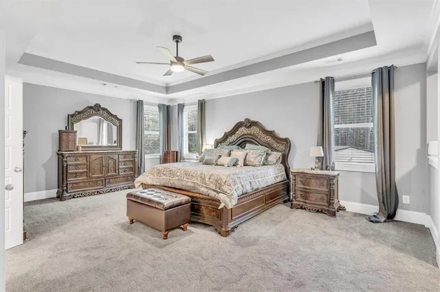 a bathroom with a tub and a shower