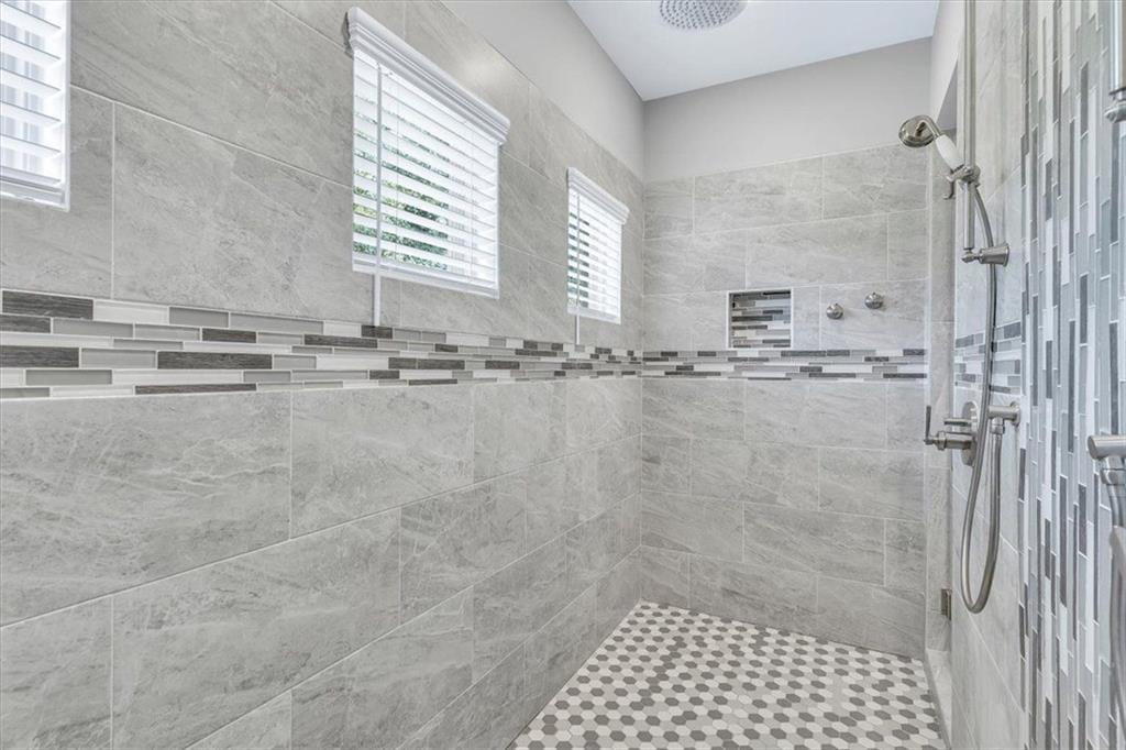 590 Eskew Road McDonough, GA 30252 - Photo 37 of 59 a bathroom with a shower and a sink