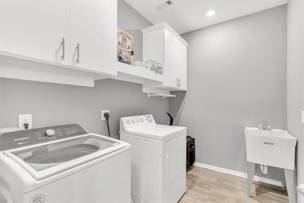 590 Eskew Road McDonough, GA 30252 - Photo 47 of 59 a utility room with dryer and washer