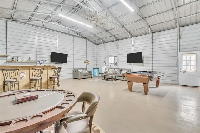 a backyard of a house with lots of green space