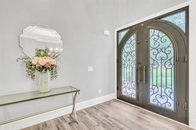 a view of hallway with balcony