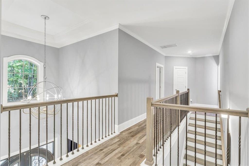 590 Eskew Road McDonough, GA 30252 - Photo 9 of 59 a view of hallway with balcony