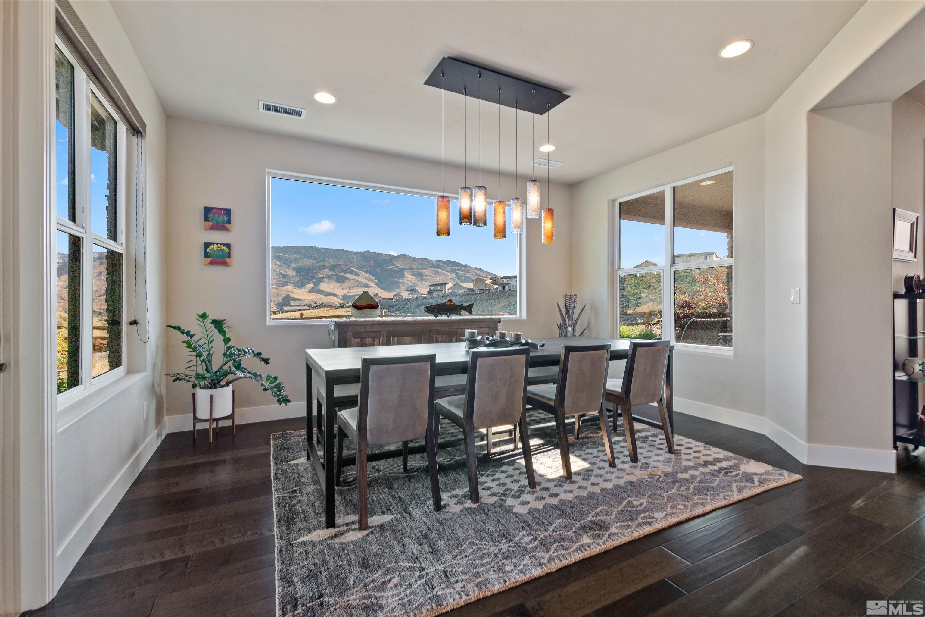1575 Scott Valley Road Reno, NV 89523 - Photo 14 of 40 a view of a dining room with furniture window and wooden floor