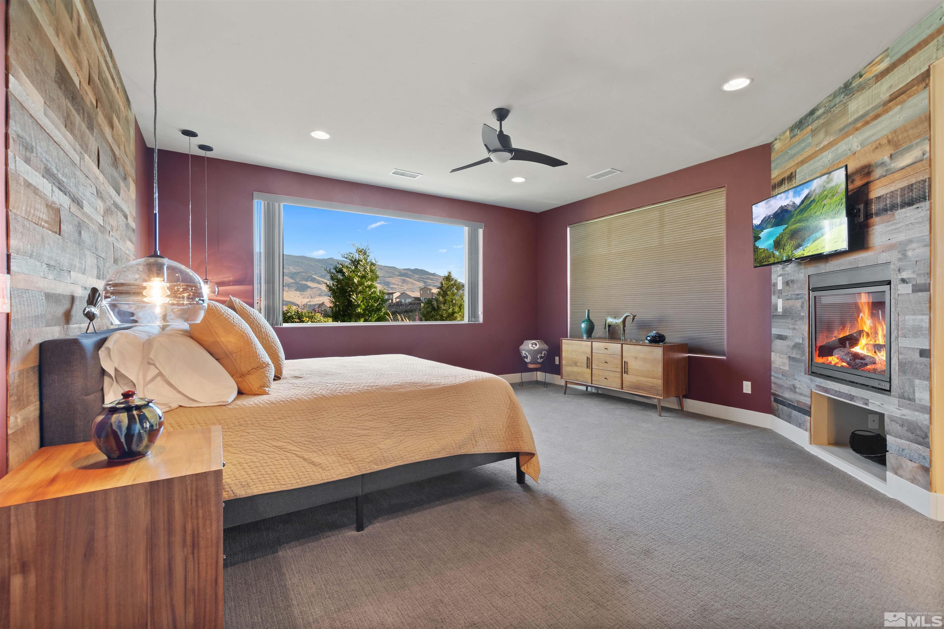1575 Scott Valley Road Reno, NV 89523 - Photo 15 of 40 a bed room with furniture and a flat screen tv