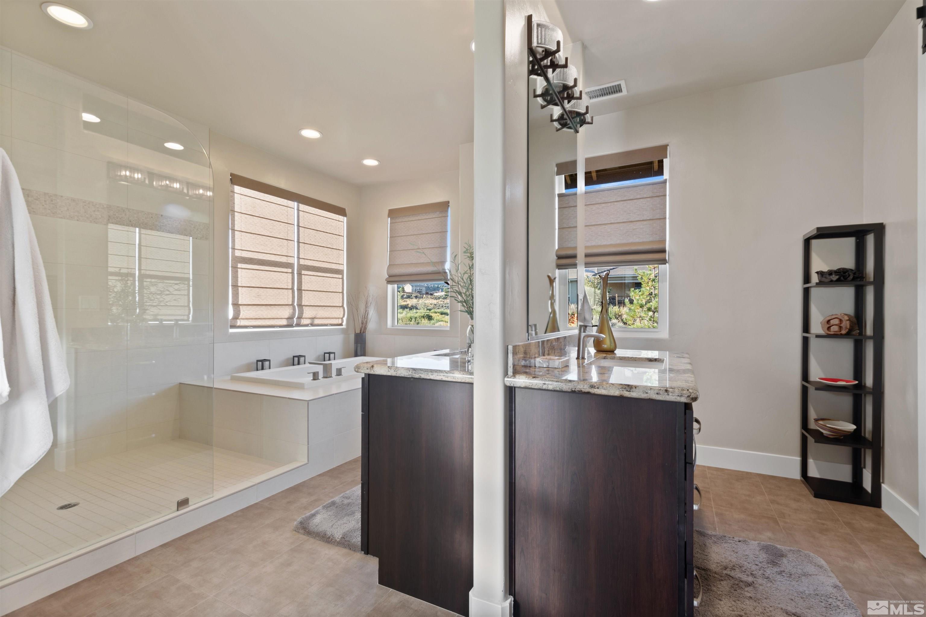 1575 Scott Valley Road Reno, NV 89523 - Photo 20 of 40 a kitchen with granite countertop a sink and refrigerator