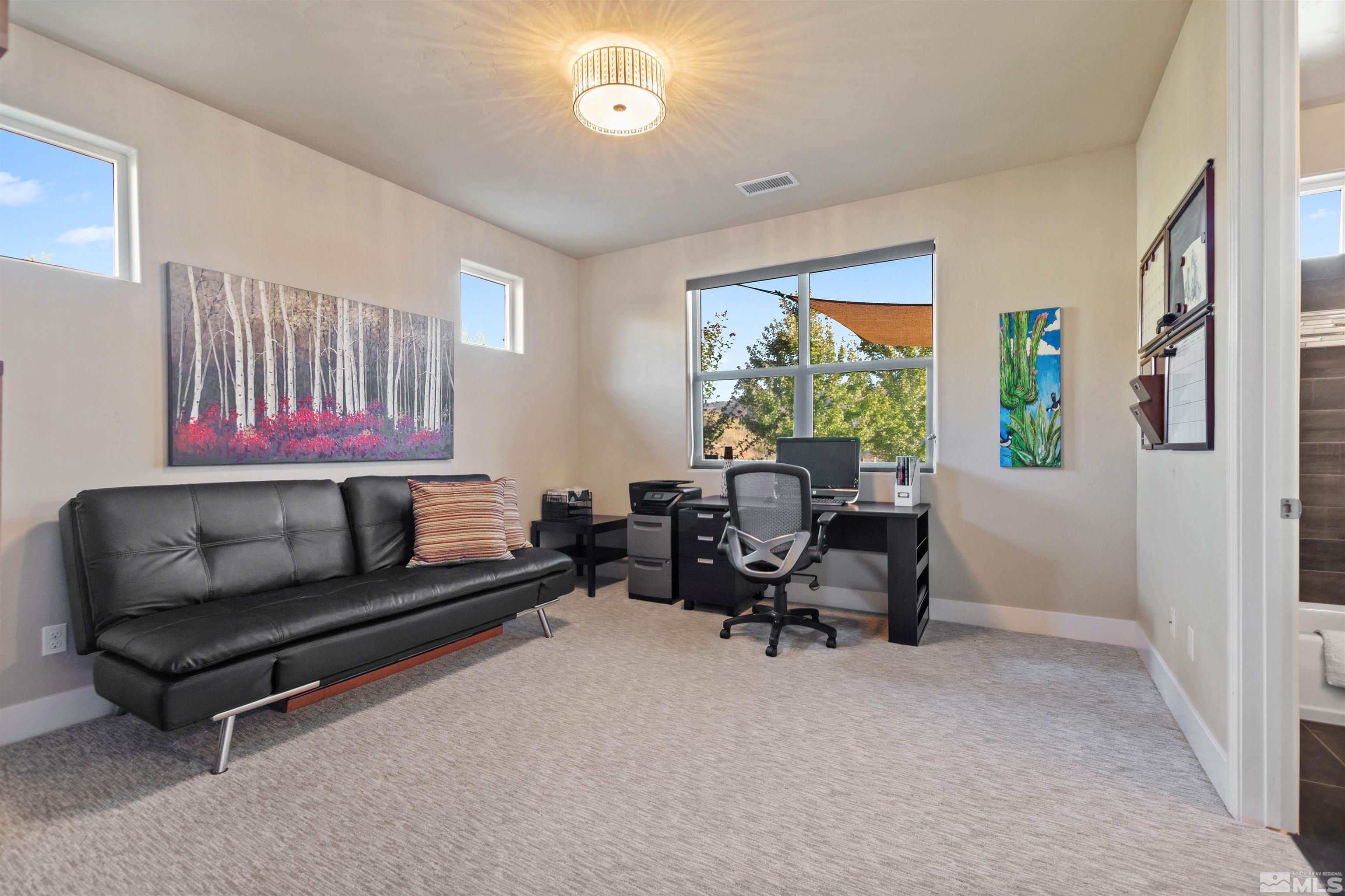 1575 Scott Valley Road Reno, NV 89523 - Photo 24 of 40 a living room with furniture and a large window