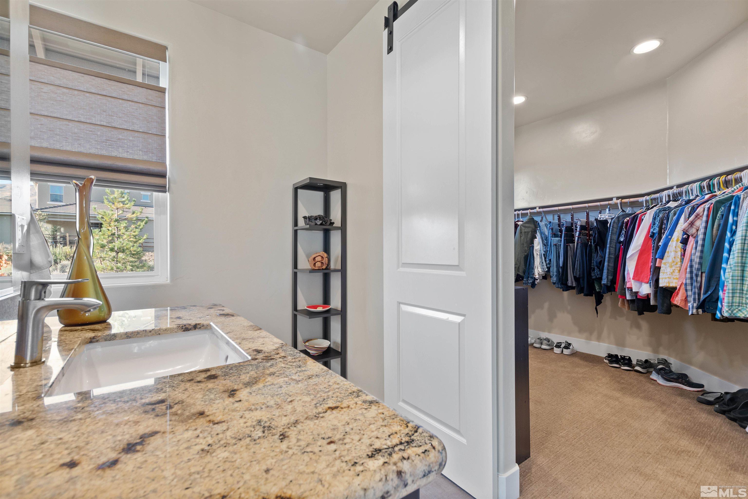 1575 Scott Valley Road Reno, NV 89523 - Photo 40 of 40 a bedroom with a bed and a window