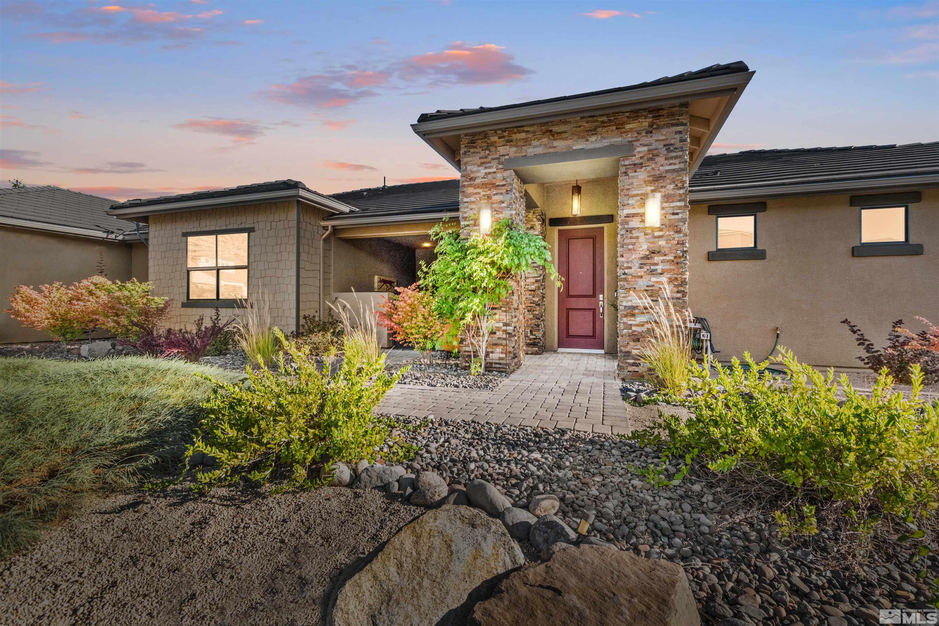 1575 Scott Valley Road Reno, NV 89523 - Photo 4 of 40 a front view of a house with garden
