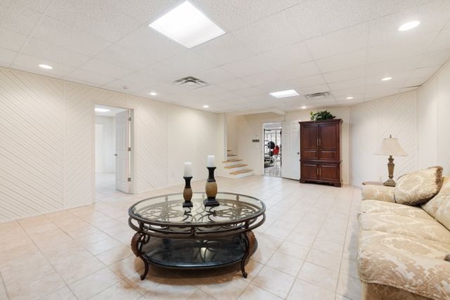 a bedroom with a bed and furniture