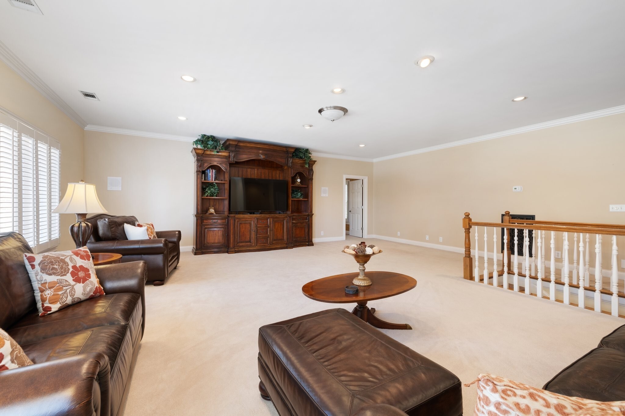 4025 Nestledown Drive Franklin, TN 37067 - Photo 35 of 57 a living room with furniture and a wooden floor