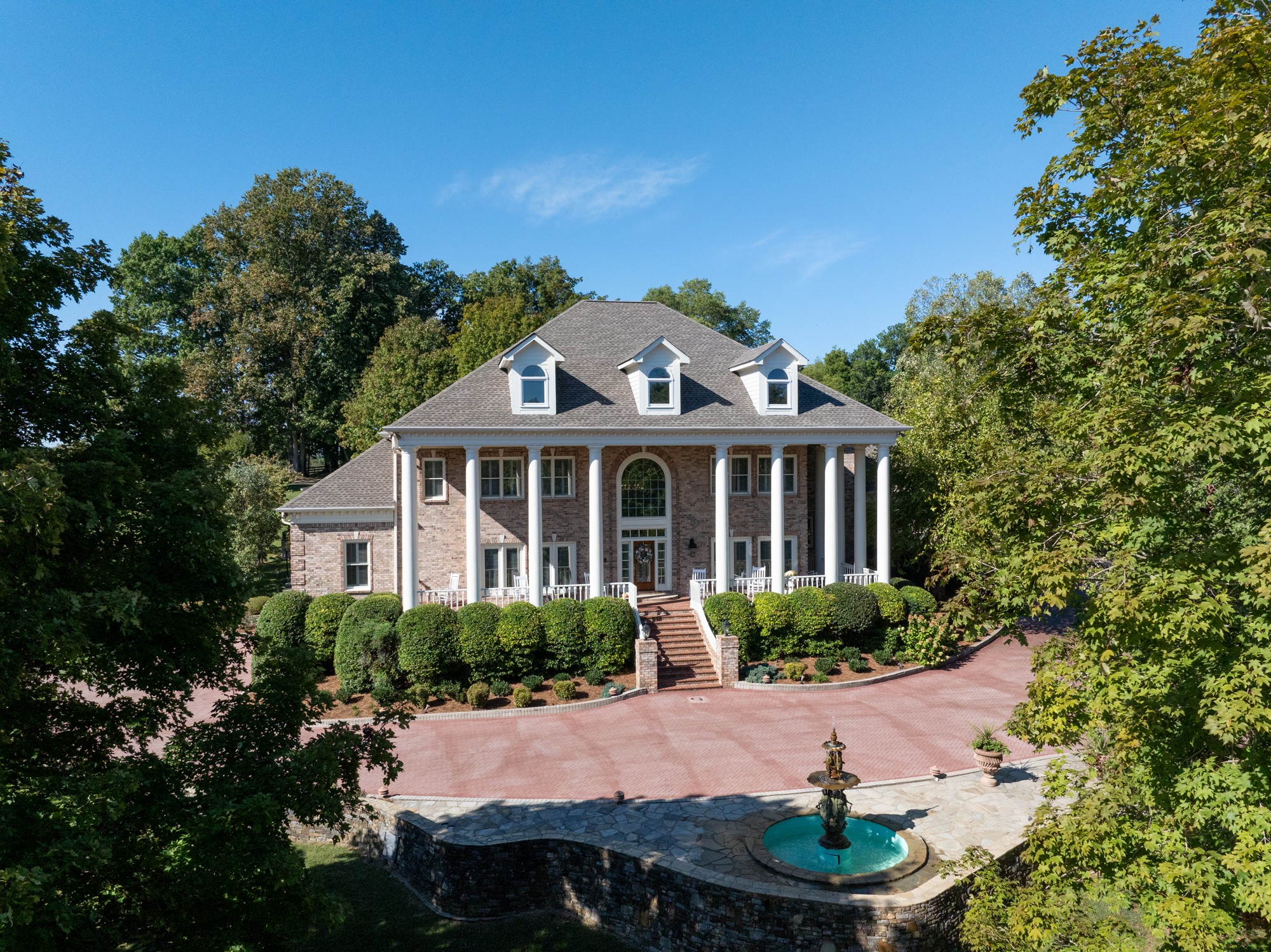4025 Nestledown Drive Franklin, TN 37067 - Photo 4 of 57 a front view of a house with a yard