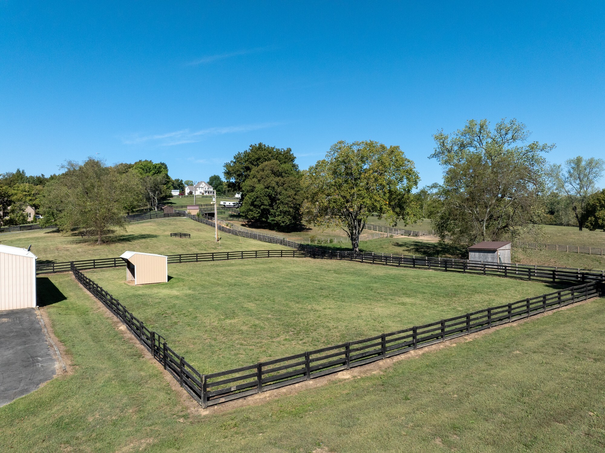 4025 Nestledown Drive Franklin, TN 37067 - Photo 52 of 57 a view of a tennis ground with large trees