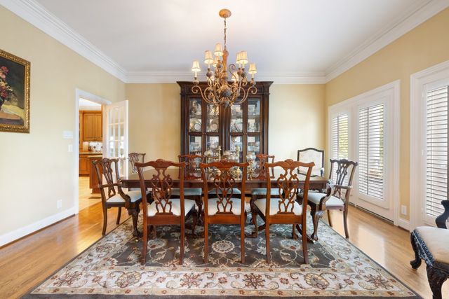 a view of a livingroom with furniture and a window