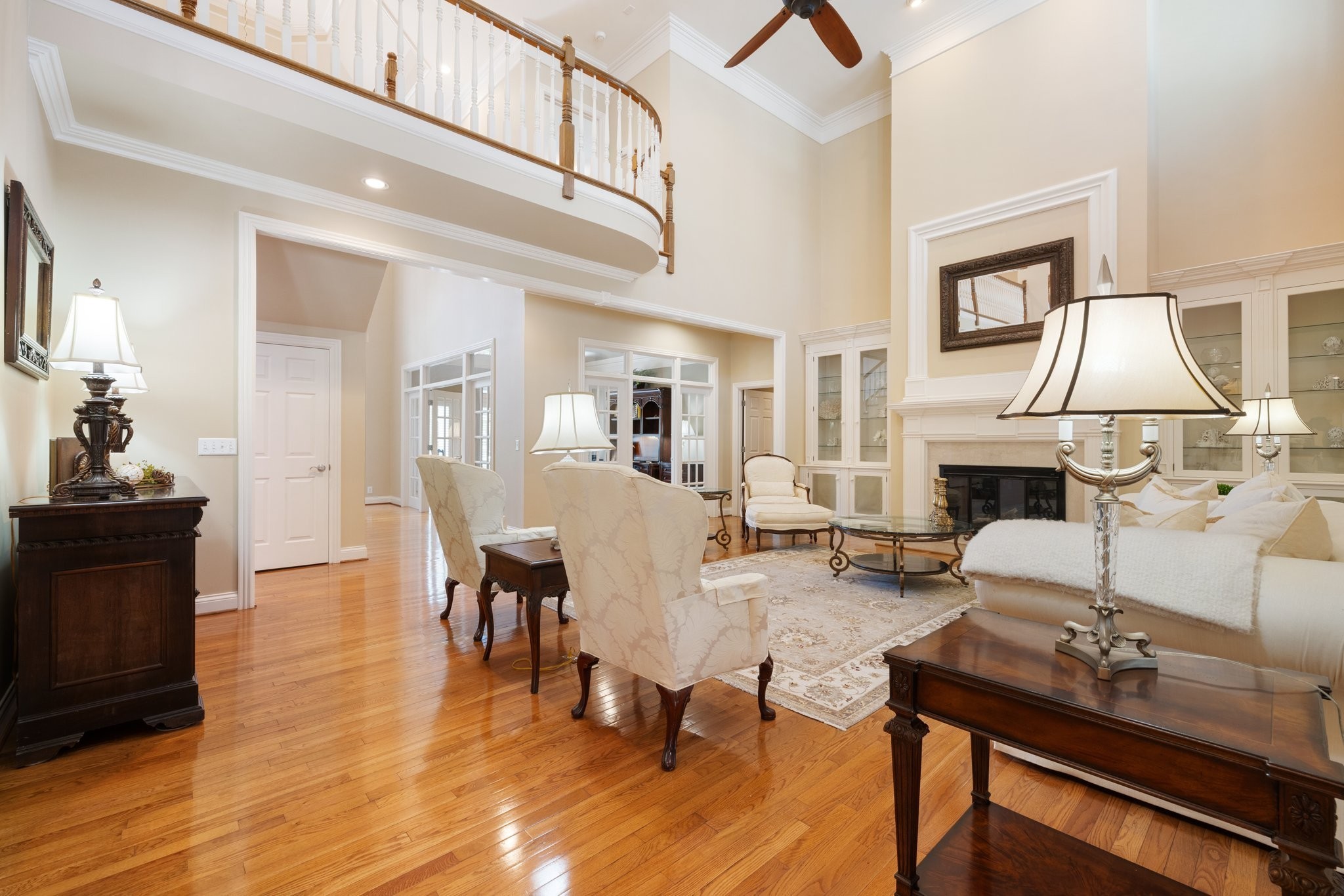 4025 Nestledown Drive Franklin, TN 37067 - Photo 10 of 57 a living room with furniture a fireplace and a flat screen tv