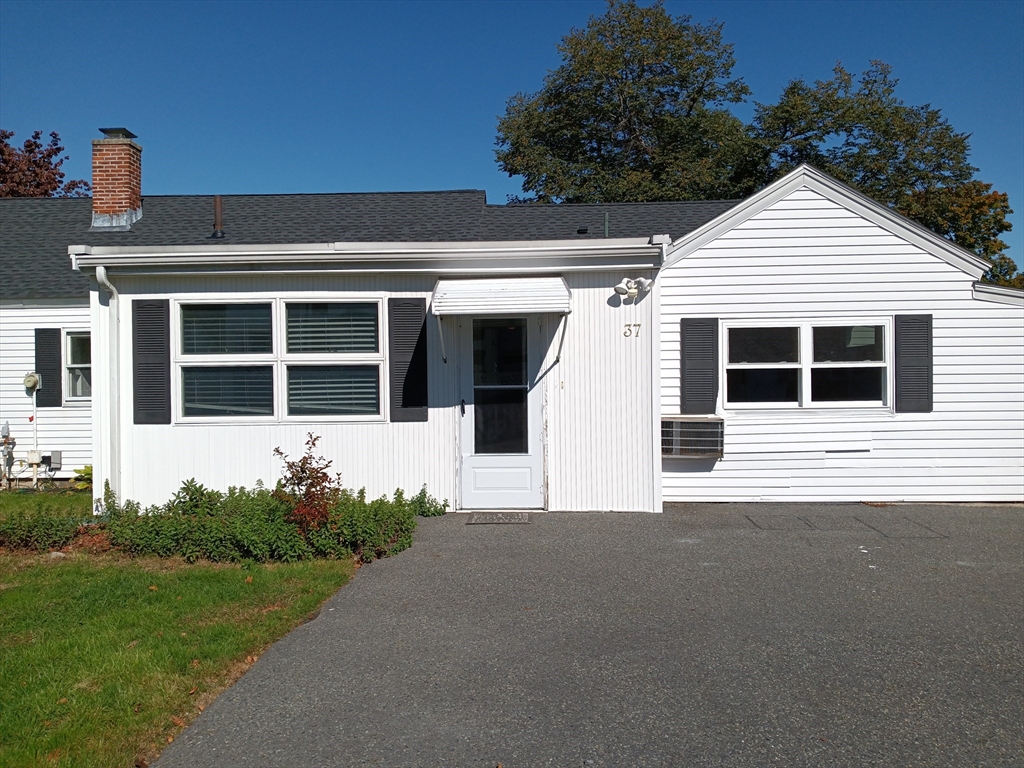 a house view with a garden space