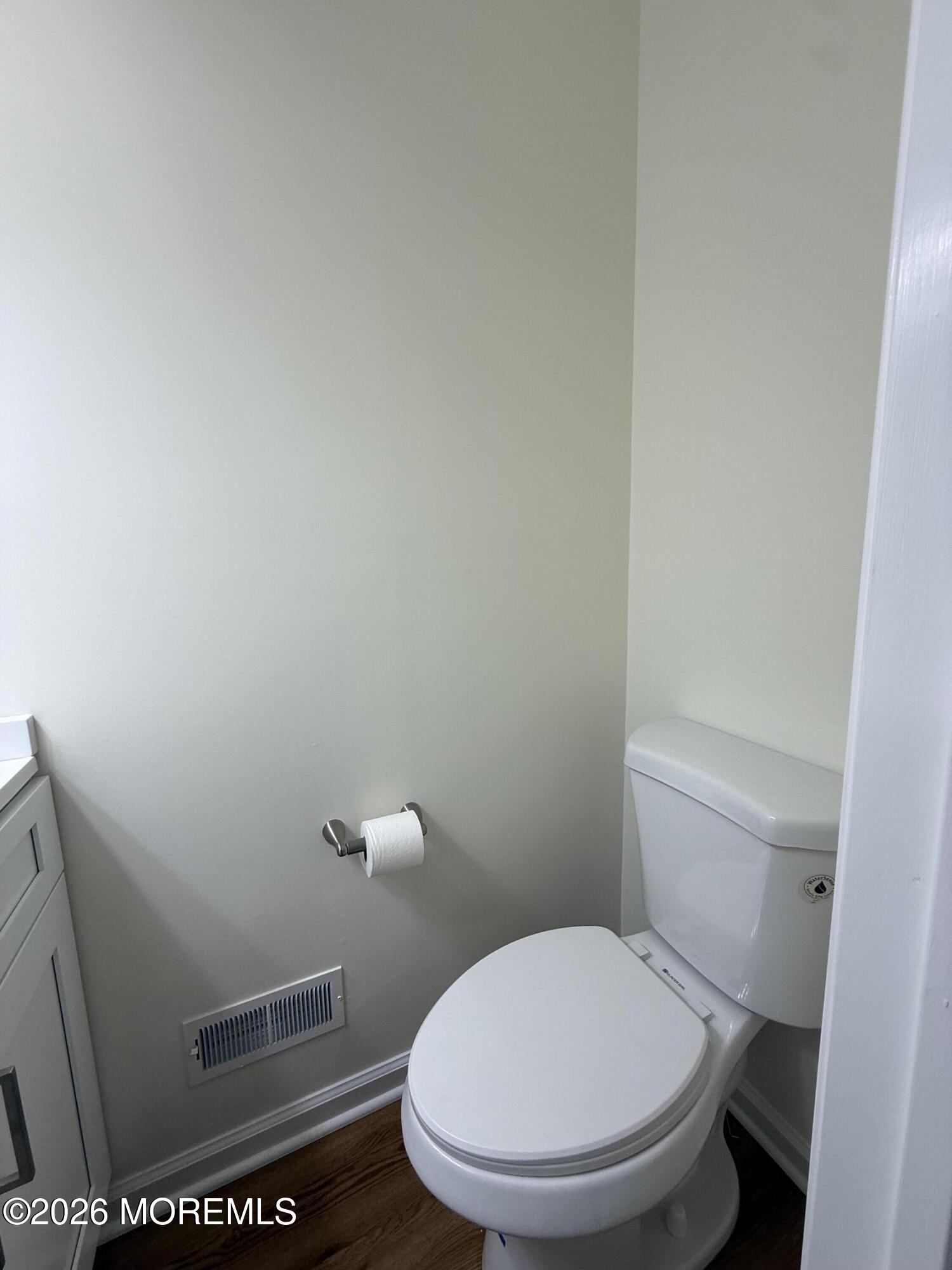 5 Canary Circle Howell, NJ 07731 - Photo 12 of 32 a white toilet sitting next to a shower