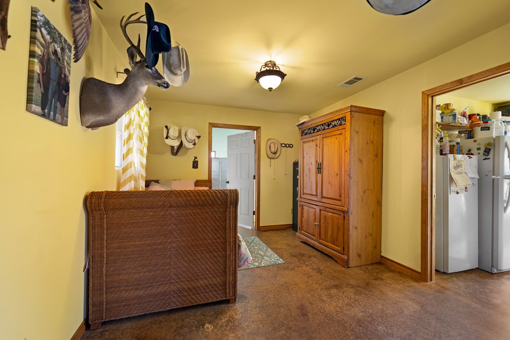 917 Bear Springs Road Mason, TX 76856 - Photo 30 of 38 a living room with furniture and a flat screen tv